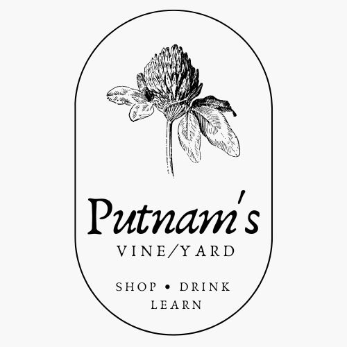 Putnam's Vineyard logo. a white background with a design of a clover flower over the words 'Putnam's Vineyard'